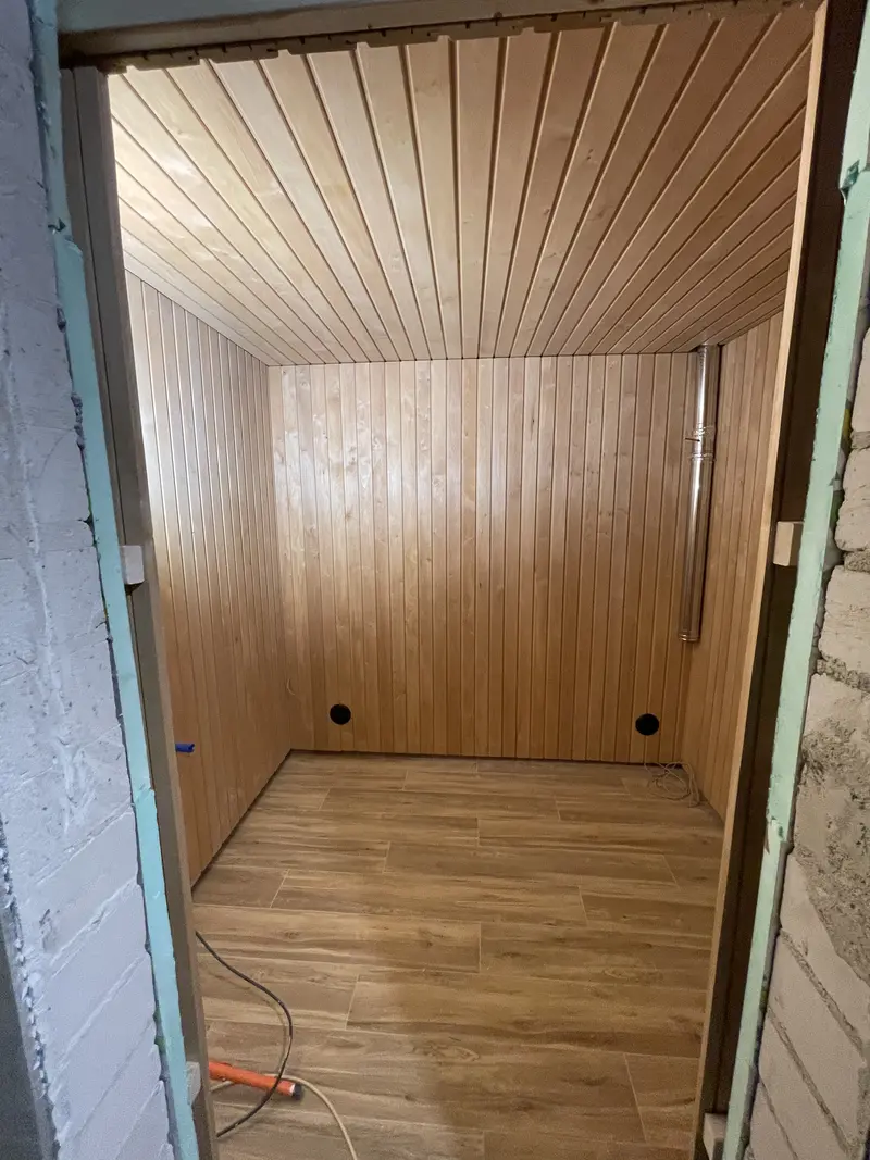 Walls and ceiling being covered with black alder